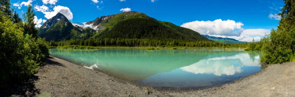 A mountain lake shown in Jacob Torres’s 2018 Iditarod trail internship account